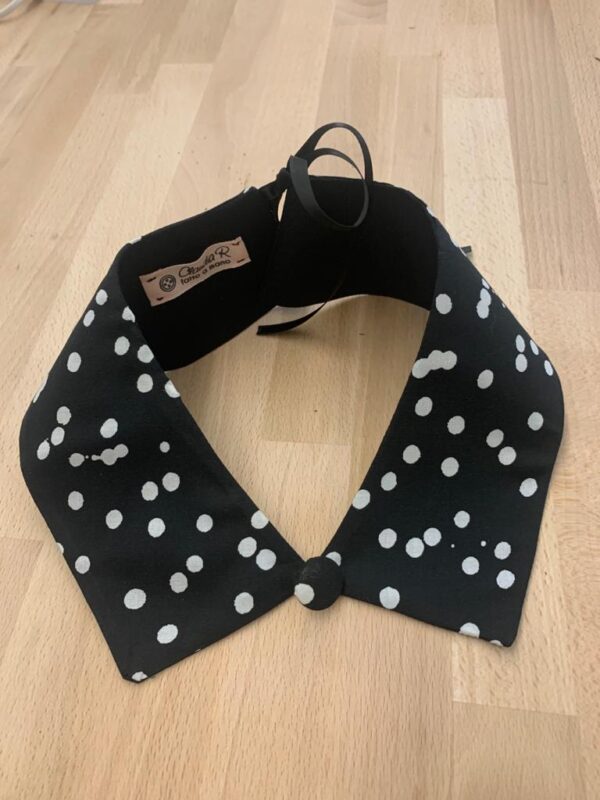 POIS SU SFONDO NERO 2